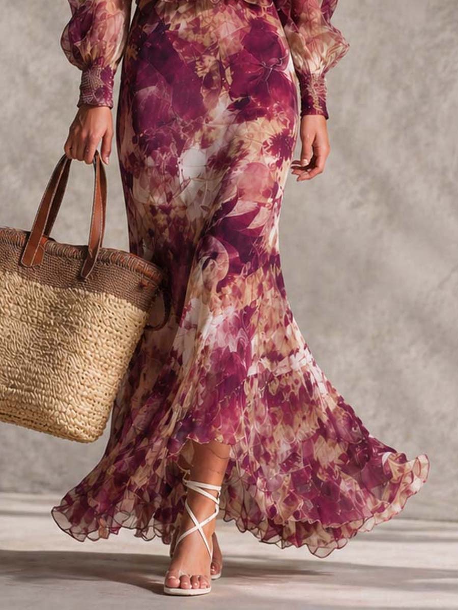 Abito lungo in chiffon rosa cipria con stampa floreale e spalle scoperte