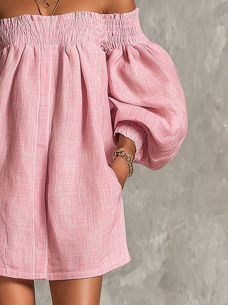 Minidress rosa cipria off-shoulder con maniche a palloncino