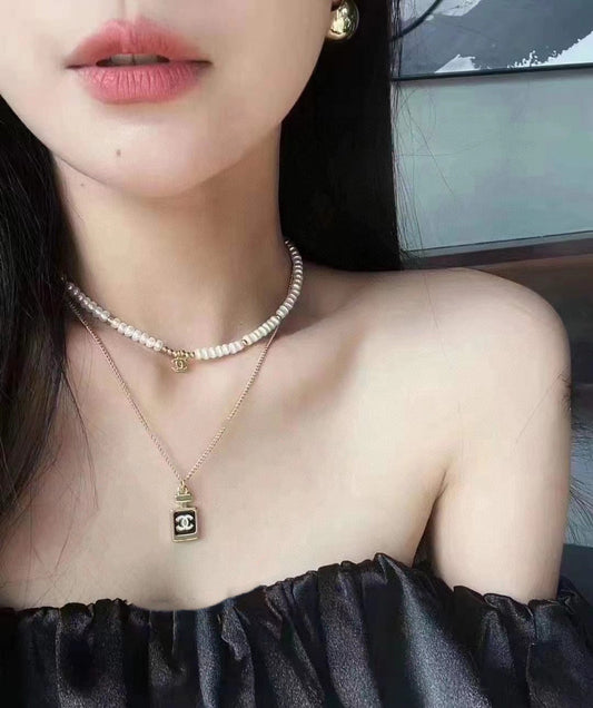18K Chanel Perfume Bottle Necklace