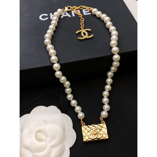 18K Chanel Pearl Bag Pendant Necklace