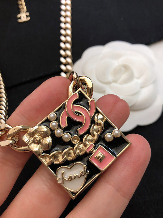 18K Chanel Pink Logo Chain Necklace