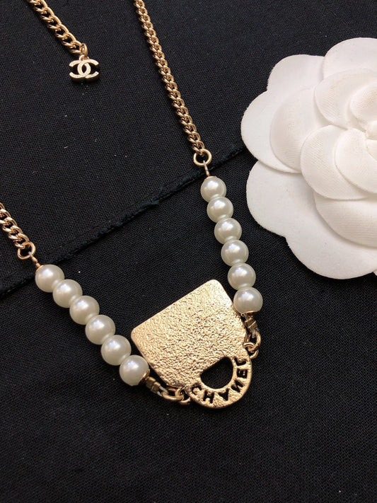 18K Chanel Pearls Bag Pendant Necklace