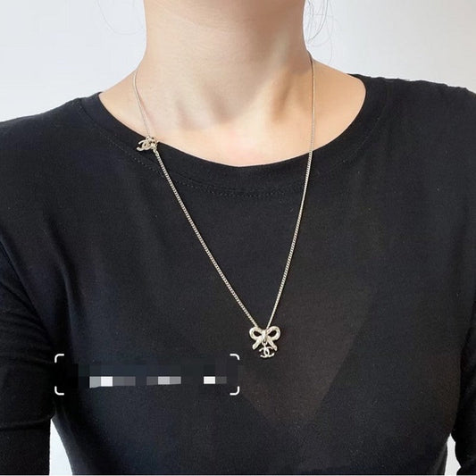 18K Chanel Gold Bow Tie Necklace