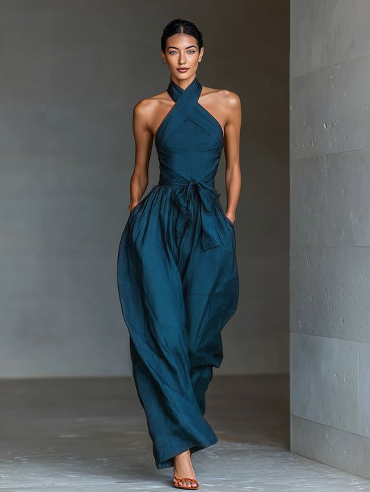 Venusta | Tuta blu navy con scollo halter incrociato e gamba ampia