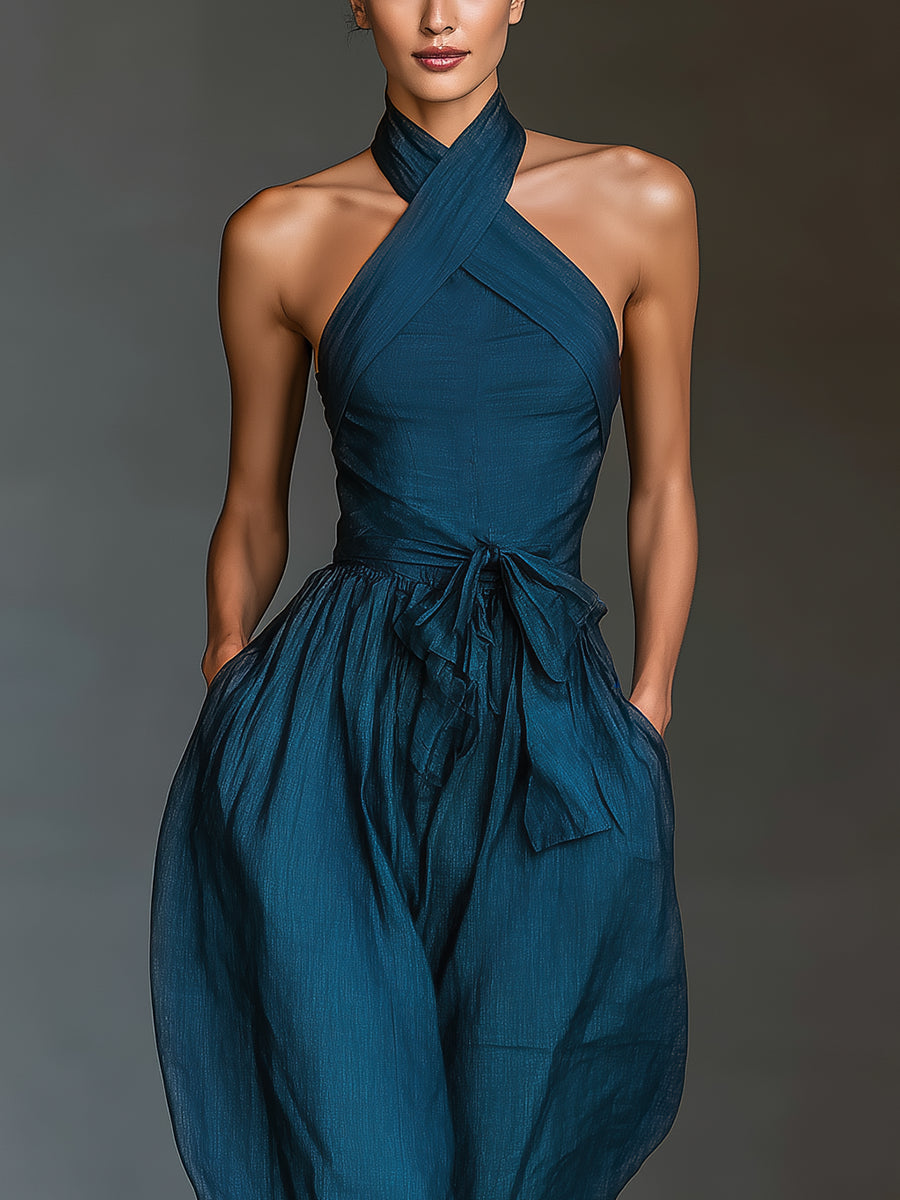 Venusta | Tuta blu navy con scollo halter incrociato e gamba ampia