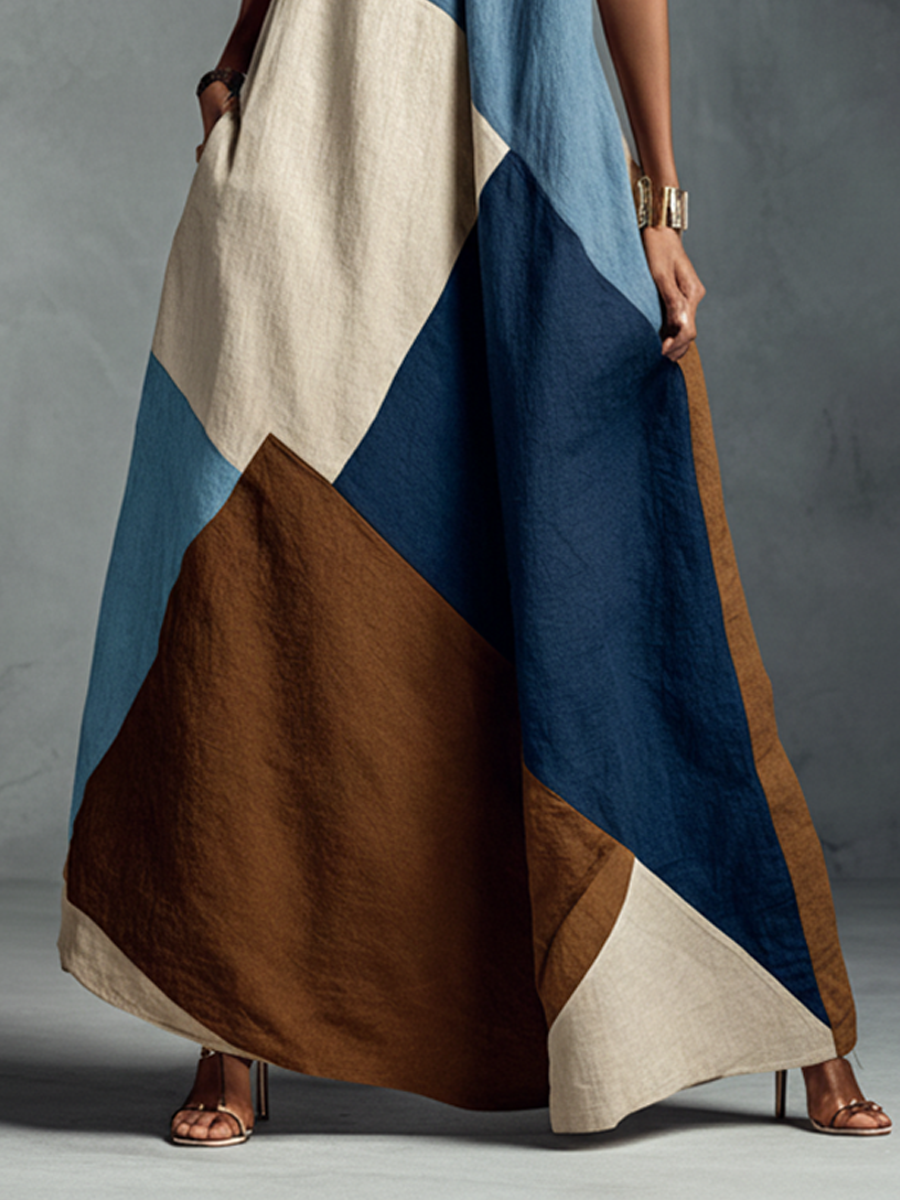Dafne | Abito maxi halter patchwork in toni terra e blu navy