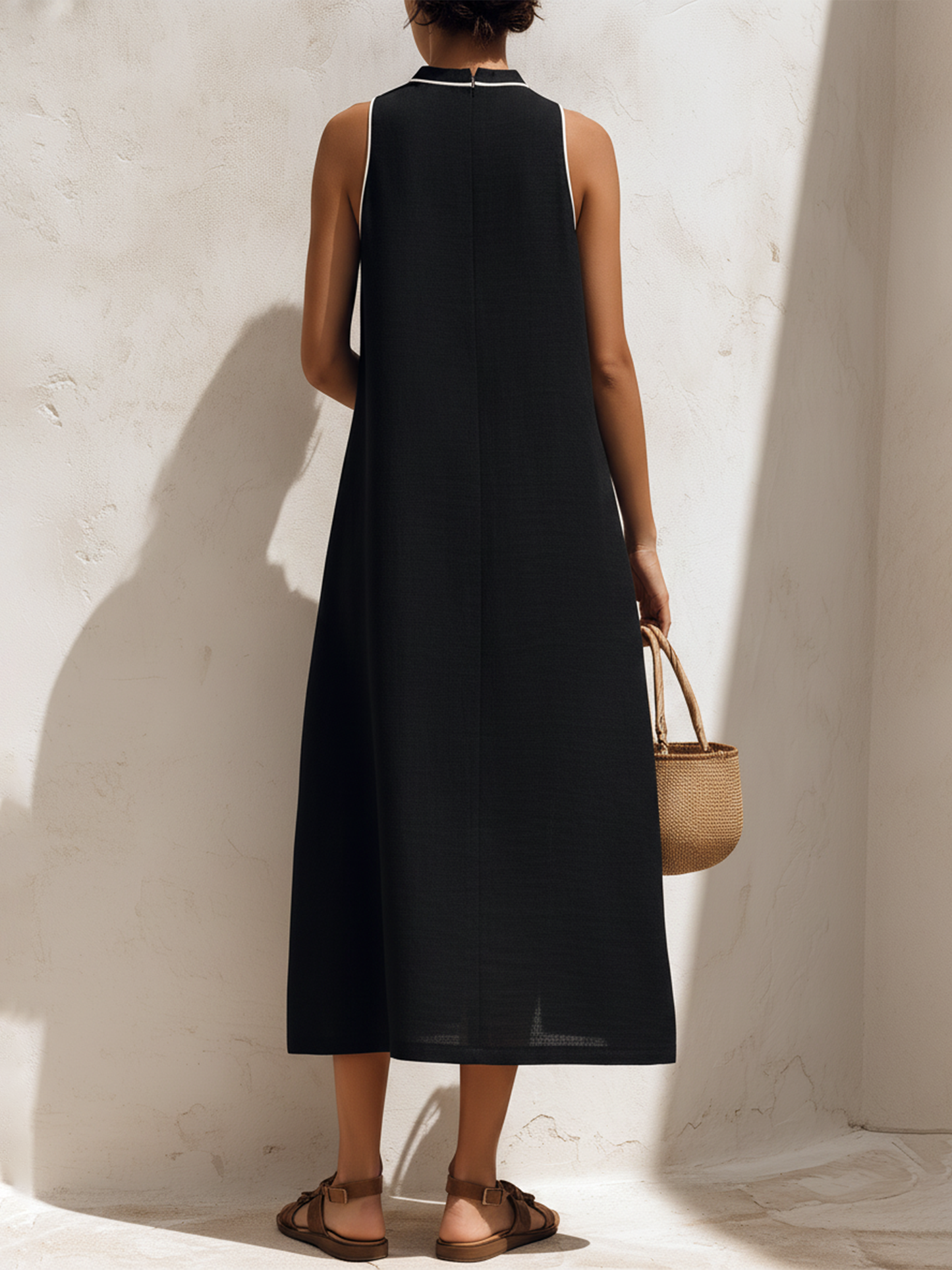 Caterina | Vestito midi nero senza maniche con rifiniture bianche