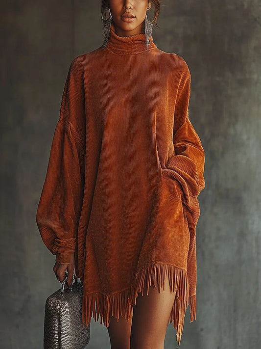 Vestito in velluto a coste arancione, taglio ampio, collo alto, orlo con nappe