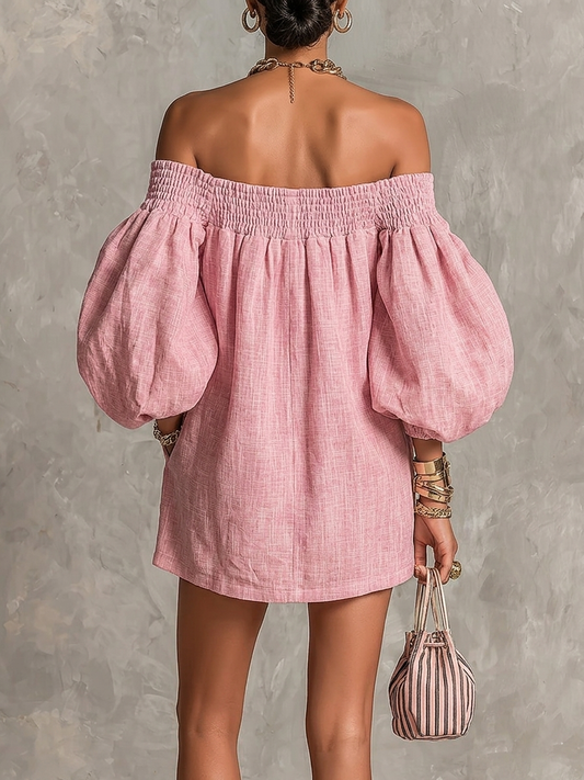 Minidress rosa cipria off-shoulder con maniche a palloncino