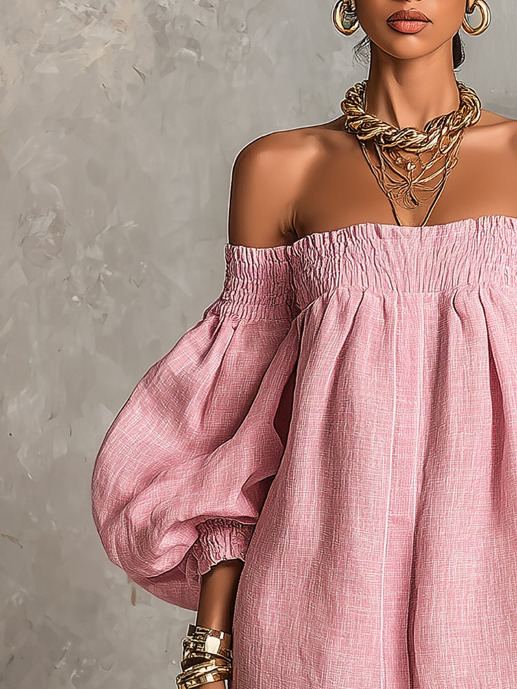 Minidress rosa cipria off-shoulder con maniche a palloncino
