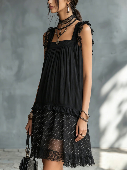 Vestito mini nero a pois trasparente con bordo in pizzo e volant