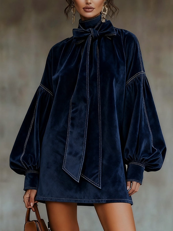 Vestito corto in velluto blu scuro con fiocco e maniche a lanterna