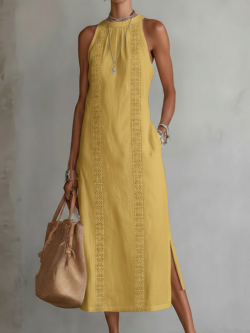 Alessandra | Abito midi smanicato bianco con dettagli ricamati e tasche laterali